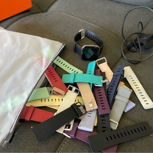 Fit bit with charger and tons of bands
